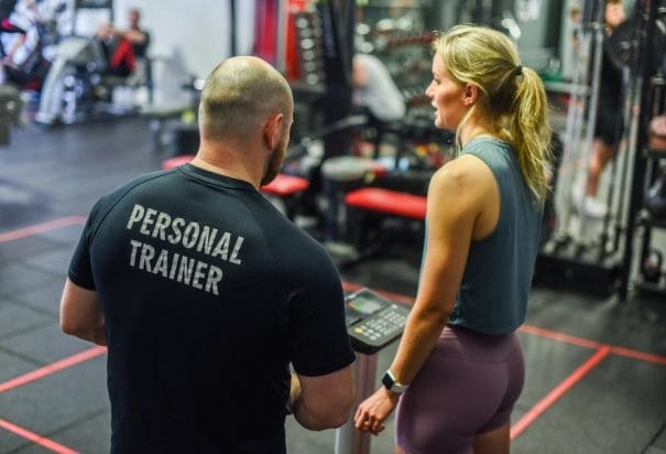 coach and blondie woman